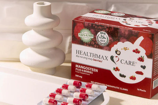 Healthmax Care Mangosteen Plus 8 Berries Food Supplement box displayed with red-and-white capsules